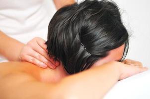 back massage at the spa and wellness center photo