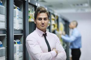 it engineers in network server room photo