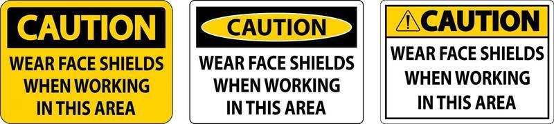 Caution Wear Face Shields In This Area Sign On White Background vector