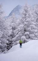 man enjoying cross country skiing photo