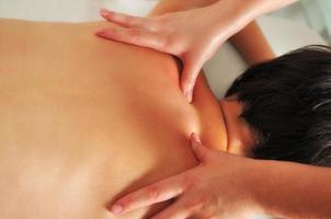 back massage at the spa and wellness center photo