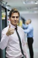 it engineers in network server room photo