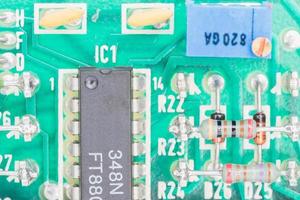 Condensers and Resistor assembly on the circuit board photo