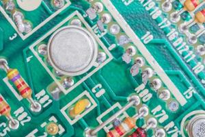 Condensers and Resistor assembly on the circuit board photo