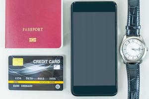 Smartphone, credit card on white photo