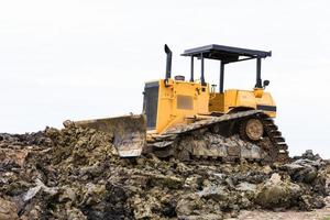 Bulldozer in construction site photo