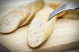 Sausage on cutting board photo