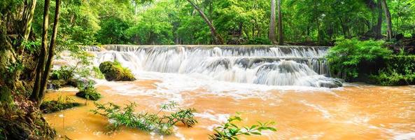 Panorama Waterfall on mountain in tropical forest at National park photo