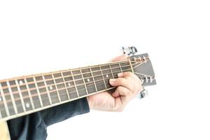 Hands playing guitar on white photo