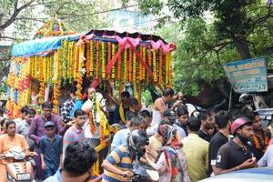 New Delhi, India July 01 2022 - A huge gathering of devotees from different parts of Delhi on the occasion of ratha yatra or rathyatra. Rath for Lord Jagannath pulled by people, Jagannath Rath Yatra photo