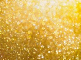 Christmas golden glow bokeh light blur abstract Background photo