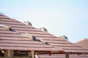 Roof house construction with lots of tile prepare to Install photo