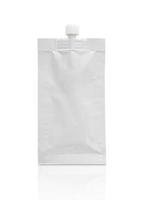 Blank white cosmetic cream sachet with plastic cap isolated on white background photo