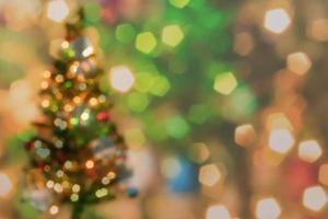 Christmas tree with bokeh light blur background photo