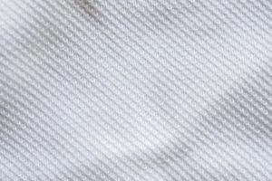 fondo de textura de jersey de ropa deportiva de tela blanca foto