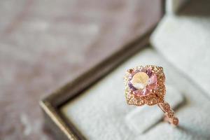 luxury vintage pink diamond ring in jewelry gift box photo