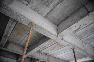 building under construction with iron steel support concrete beams photo