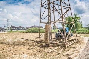 pile driver at construction site photo