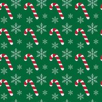 Christmas seamless pattern with candy canes and snowflakes on green background. For wrapping paper, fabric print, greeting cards design vector