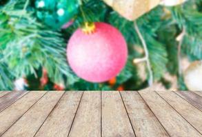 Christmas holiday background with empty rustic wood table photo