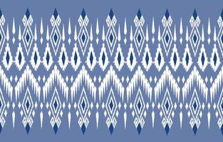 patrón étnico ikat sin fisuras. Fondo de vector de bordado tradicional indio africano tribal. azteca tela alfombra batik ornamento cheurón textil decoración papel pintado