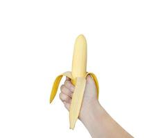 banana peel in hand on a white background photo
