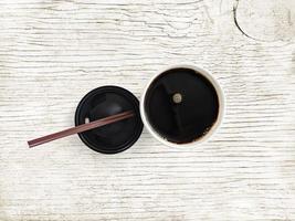 coffee mug, top view, isolated on white wooden table photo