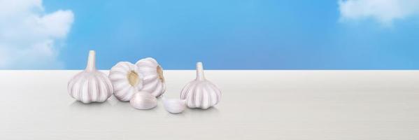 raw garlic isolated on white table background sky figure text input area photo