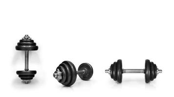 Metal dumbbells. Isolated on white background. Gym, fitness and sports equipment symbol. Area for entering text photo