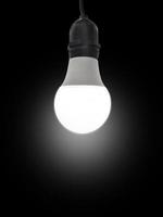 LED light bulbs light bulbs The evolution of energy-saving lamps on a black background. photo