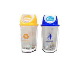 Regular trash and recycling bins are separated with white background. recycling concept photo