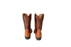 Brown cowboy boots on a white background. photo