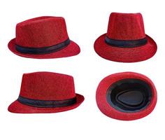 red straw hat with black ribbon on white background photo