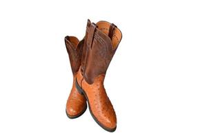 Brown cowboy boots on a white background. photo