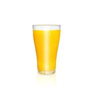 A glass of orange juice has orange pulp mixed on a white background. with reflections of orange glass photo