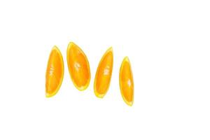 Sliced orange slices, top view on a white background. photo