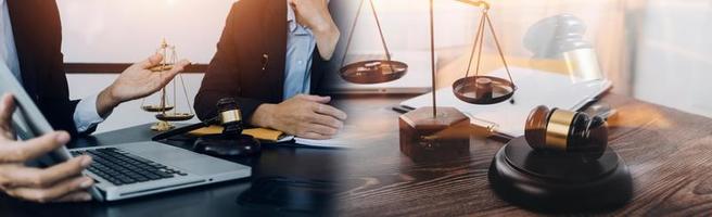 Judge gavel with Justice lawyers having team meeting at law firm in background. Concepts of law. photo