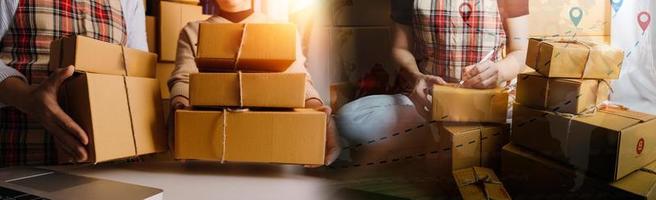 Business woman start up small business entrepreneur SME success .freelance woman working at home with Online Parcel delivery. SME and packaging deliveryconcept photo