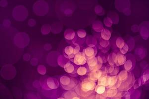 Dark purple Festive Christmas Beautiful abstract Background with bokeh lights. Holiday Texture with copy space. Can be used as Wallpaper, filling for a website, defocused photo