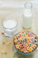 Reptientes with milk on a wooden table and rustic kitchen background. Alternative milk concept. Front view. Horizontal composition photo