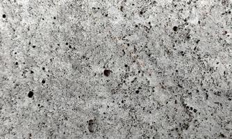Texture of old concrete wall.Concrete wall of light grey color cement texture background.Grey pastel rough crack cement texture stone concrete,rock plastered stucco wall painted flat fade background. photo