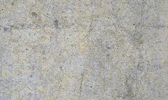 textura de la antigua pared de hormigón.pared de hormigón de color gris claro fondo de textura de cemento.gris pastel textura de cemento de grieta áspera hormigón de piedra,pared de estuco enlucida de roca pintada de fondo de desvanecimiento plano. foto
