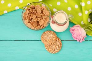 Breakfast on a blue wooden table. Tablecloth in polka dots and mothers day. Copy space and selective focus photo