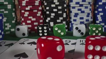 Gambling Tools Like Poker Cards Money Chips and Red Dices video