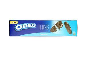 KHARKIV, UKRAINE - FEBRUARY 14, 2021 Oreo thins crispy cookies pack. The brand Oreo is owned by company Mondelez international photo