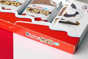 TERNOPIL, UKRAINE - JUNY 3, 2022 Kinder Chocolate Cards product pack. Kinder is a confectionery product brand line of multinational confectionery Ferrero. photo