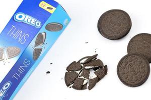 KHARKIV, UKRAINE - FEBRUARY 14, 2021 Oreo thins crispy cookies pack. The brand Oreo is owned by company Mondelez international photo