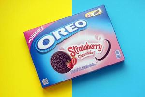 TERNOPIL, UKRAINE - MAY 28, 2022 Oreo strawberry cheesecake crispy cookie box. The brand Oreo is owned by company Mondelez international photo