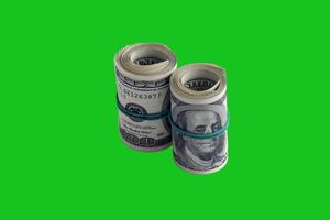 Bundle of US dollar bills isolated on chroma keyer green. Pack of american money with high resolution on perfect green mask photo