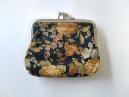 isolated vintage wallet with flower pattern. Good for any kind of business related to classic, retro, money, saving photo